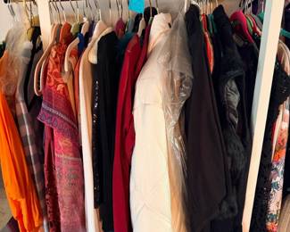 “Racks of women’s clothing (mostly Small Medium & Large) – dresses, tops, jackets, coats and more, priced to move.”