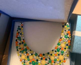 “Large estate jewelry selection – multiple tables of costume jewelry, boxed sets, loose pieces, and organizers.”