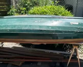 Glued lapstrake wooden boat for restoration