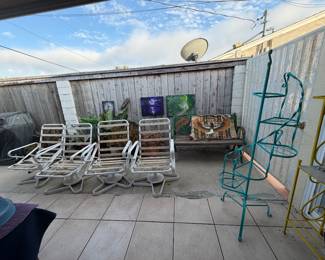Vintage patio furniture and plant rack