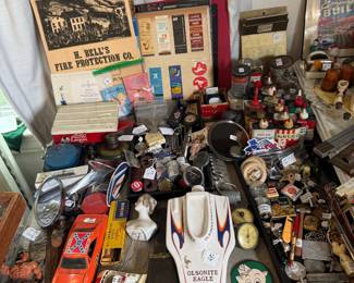 Books of matchbooks, Buddy L toy camper, oil cans etc
