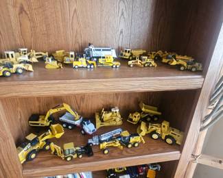 Located at upcoming estate sale die cast toy trucks $4 each
