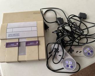 Vintage Nintendo console and.....