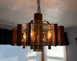 MCM Fredrick Ramond design chandelier featuring brass and smoked glass panels