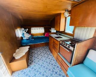 Original stove, sink, booths reupholstered- 