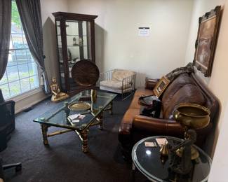 Brass Pedestal Bowl, Glass-Top Table, Leather Sofa, Women's Shoes, Woven Tray, Wooden Display Cabinet
