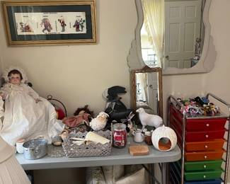 Needlepoint, Madame Alexander dolls and rolling carts