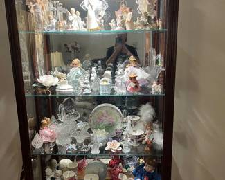 Howard miller curio cabinet loaded with Fenton, Willow Tree, Capodimonte, Collectables