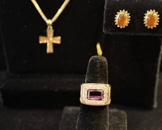 Gold cross, carnelian gold and diamonds earrings, diamond and synthetic center stone ring