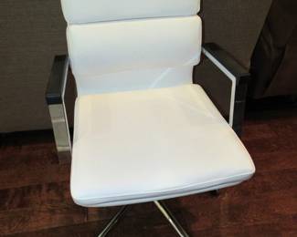 White vinyl & chrome swivel chair