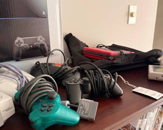 Sony PlayStation 4 Console Bundle with Multiple Controllers and Games, plus Handheld Devices