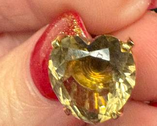 Singular faceted smoky topaz in 14K gold setting $100