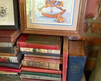 Antique books, framed print, and skeleton keys