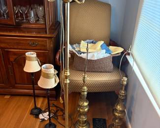 Brass floor lamp and armchair