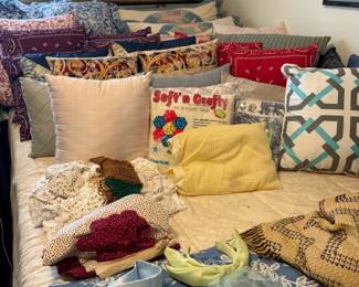 Assorted pillows and linens