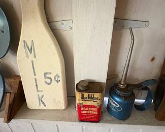 Vintage milk sign and oil can
