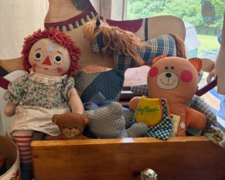 Raggedy Ann doll and rocking horse toys