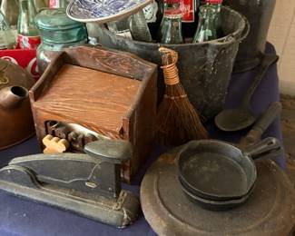 Cast iron toy stove with pans