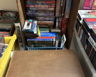 DVDs, VHS tapes, and briefcase