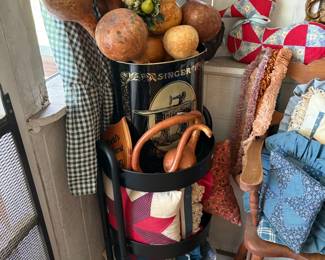 Vintage quilts and stoneware crock
