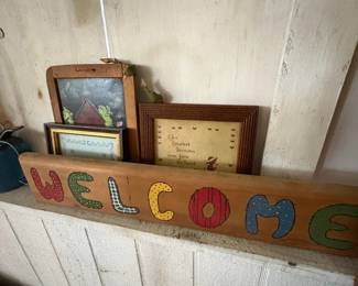 Welcome sign and framed country decor
