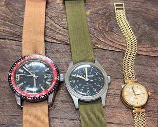 Vintage military-style wristwatches and gold-tone watch