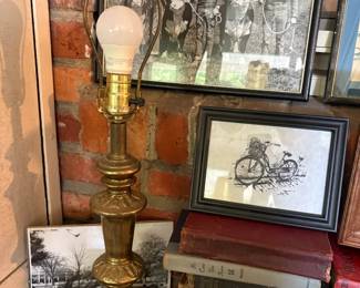 Brass oil lamp and framed prints