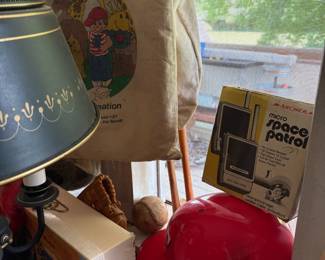 Vintage lamp, Space Patrol book, and toys