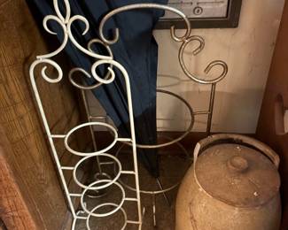 Wrought iron rack and umbrellas