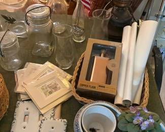 Glass jars, oil lamp, and porcelain planters