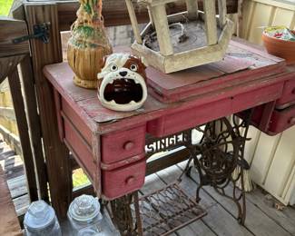 Painted treadle sewing table and lanterns