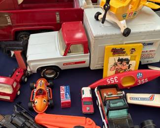 Vintage toy fire truck and trucks
