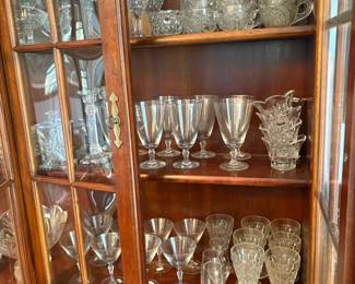 China cabinet with crystal stemware