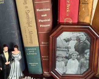 Vintage books and framed photos