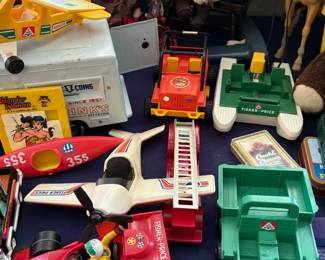 Vintage toy trucks and toy piano
