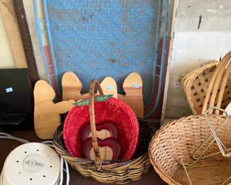 Baskets, folding chair, and wooden cutouts