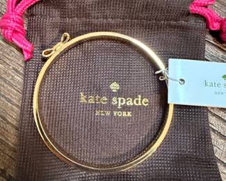 Kate Spade gold tone bangle, new with tags