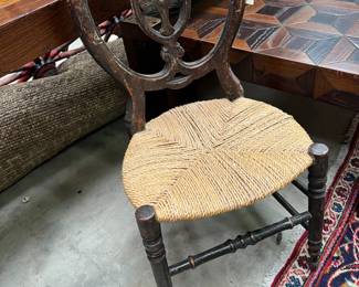 antique child's chair with rush seat