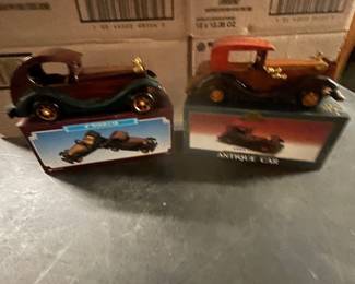 Two wood and metal model cars