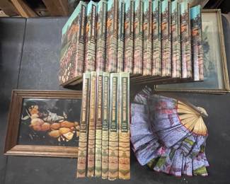 Gardening books with pictures and a gardening visor