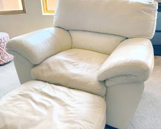 Cream colored leather chair and ottoman