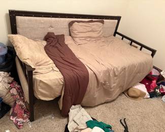 Day bed, mattress included.  The mattress has never been used.  Bedding will be removed.