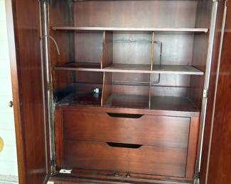 Interior of large armoire previously pictured.