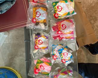Complete set of original McDonald's Happy Meal teenie beanies, still in packages.  Some numbers have more than one doll. Excellent condition.