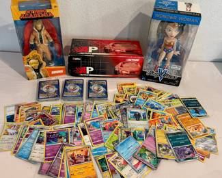 ASSORTED ACTION FIGURES TOYS AND RANDOM LOOSE POKÉMON CARDS