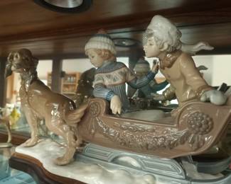 Lladro kids on sleigh ride