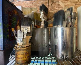 Two Buckets Of Painting Brushes
