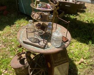 Assortment of Metal Decor Items including Table Flowers Display Tower and Wagon Wheels
