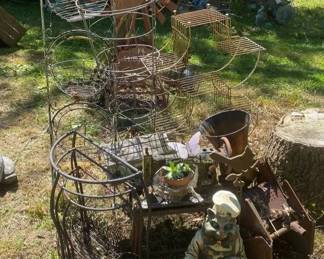 Plant Cages and Baskets with Assorted Lawn Decor