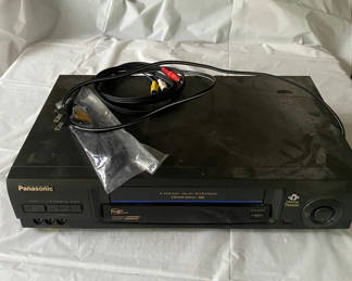 Lot 52: VHS Player & VHS Tapes